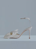 White Satin Over-Sized Bow Round Stiletto Heeled Sandals For Bride With Buckle Ankle Strap